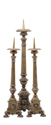 Lot 17 - A PAIR OF SILVERED BRASS BAROQUE STYLE ALTAR CANDLESTICKS