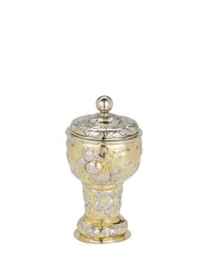 Lot 20 - A GERMAN PARCEL-GILT-SILVER PEDESTAL BEAKER