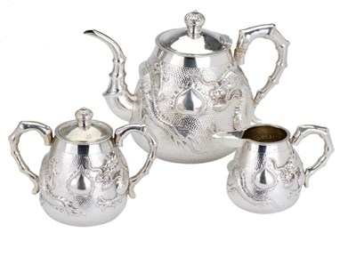 Lot 26 - A CHINESE SILVER THREE-PIECE TEA SET