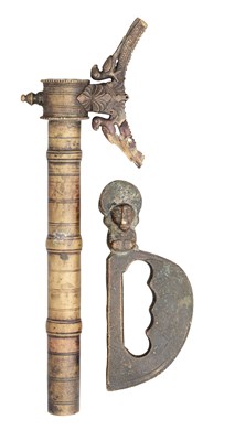 Lot 539 - A SOUTH INDIAN MOUNT FOR AN AXE, AND A KNUCKLE-PUNCH, 19TH CENTURY OR EARLIER