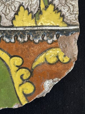 Lot 45 - A MUGHAL CUERDA SECA TILE, FROM THE TOMB OF MADANI, SRINAGAR, MID-17TH CENTURY