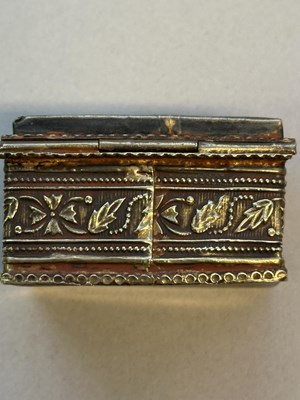 Lot 55 - A SMALL SILVER-GILT BOX WITH THEWA WORK, PRATAPGARH, RAJASTHAN, 19TH CENTURY