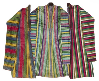 Lot 140 - THREE STRIPED SATIN CHAPAN, PROBABLY AFGHANISTAN, 20TH CENTURY