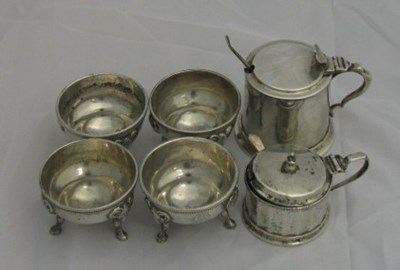 Lot 92 - A SET OF FOUR VICTORIAN SILVER SALT CELLARS