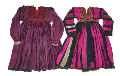 Lot 71 - TWO EMBROIDERED AND APPLIQUE WAZIRI DRESSES, AFGHANISTAN OR PAKISTAN, EARLY 20TH CENTURY
