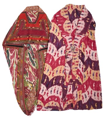 Lot 27 - AN EMBROIDERED AND IKAT KARAKALPAK KIYMESHEK (CLOAK), AND A QUILTED IKAT PARANJA, 1875-1900