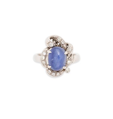 Lot 66 - STAR SAPPHIRE AND DIAMOND RING, 1950s