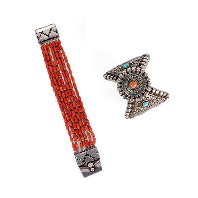 Lot 404 - A TURQUOISE AND CORAL SET SILVER BRACELET, NEPAL OR TIBET, 19TH/20TH CENTURY