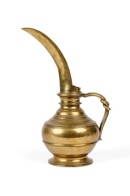 Lot 429 - A BRASS RITUAL EWER, SRI LANKA OR SOUTH INDIA, 18TH/19TH CENTURY