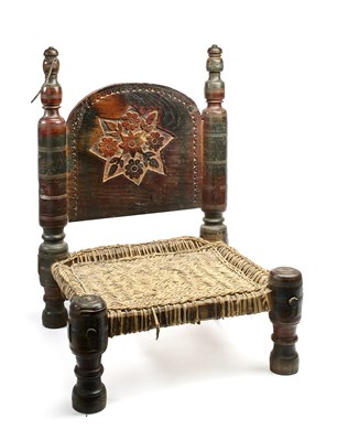 Lot 119 - A CARVED AND TURNED WOOD LOW CHAIR, SWAT VALLEY, PAKISTAN, 19TH OR EARLY 20TH CENTURY