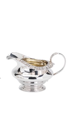 Lot 105 - A GEORGE IV SILVER MILK JUG