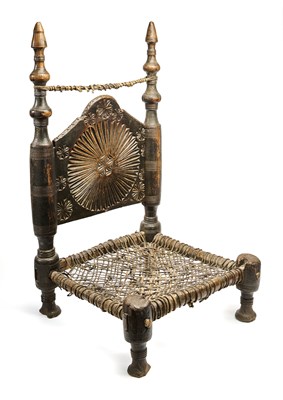 Lot 121 - A CARVED AND TURNED WOOD LOW CHAIR, SWAT VALLEY, PAKISTAN, 19TH OR EARLY 20TH CENTURY