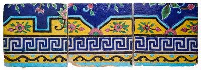 Lot 379 - THREE QAJAR CUERDA SECA BORDER TILES, PERSIA, 19TH CENTURY