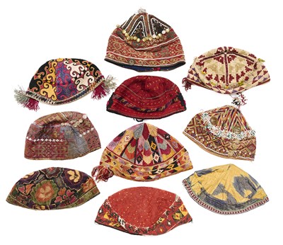 Lot 157 - A COLLECTION OF HATS, UZBEK, AFGHAN AND TURKMAN, 20TH CENTURY