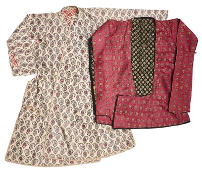 Lot 44 - A WOMAN'S SILK AND METAL THREAD BROCADE JACKET AND A QUILTED KALAMKARI COAT, IRAN, 18TH/19TH CENTURY