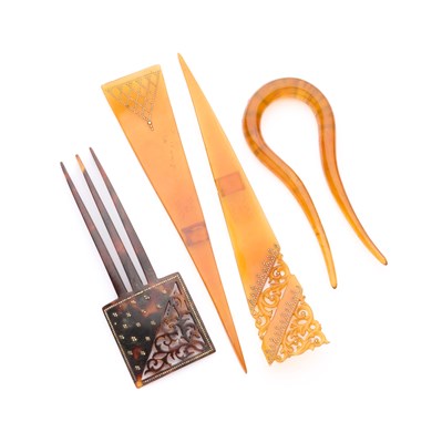 Lot 20 - FOUR VICTORIAN PIQUE TORTOISESHELL HAIR COMBS, 1890s