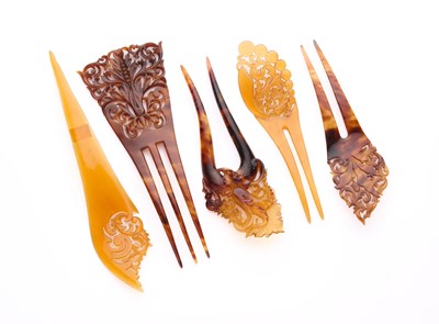 Lot 22 - FIVE VICTORIAN TORTOISESHELL HAIR COMBS, 1890s