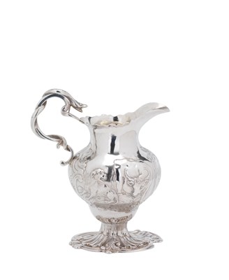 Lot 148 - A GEORGE II SILVER MILK JUG