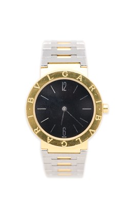 Lot 5 - BULGARI, 'BVLGARI BVLGARI', REF. A5055: GOLD AND STAINLESS STEEL BRACELET WATCH, CIRCA 1990