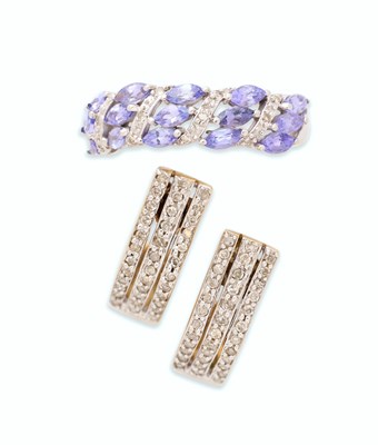 Lot 94 - A TANZANITE AND DIAMOND RING AND A PAIR OF DIAMOND EARRINGS
