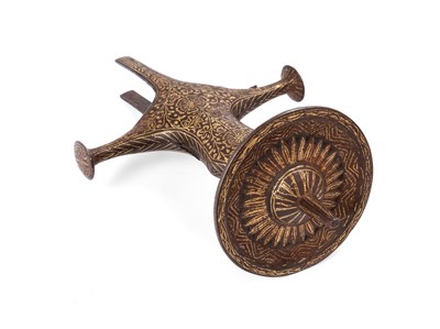 Lot 105 - AN INDIAN TALWAR HILT, 19TH CENTURY