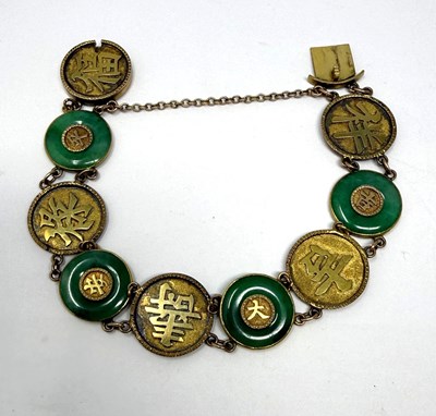 Lot 386 - GOLD AND JADEITE BRACELET, 1900s