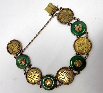 Lot 386 - GOLD AND JADEITE BRACELET, 1900s