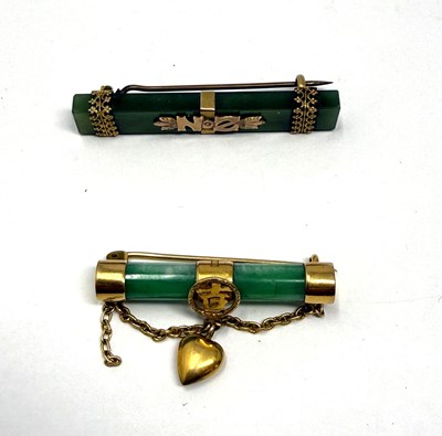 Lot 385 - TWO GOLD AND JADEITE BAR BROOCHES, 1900s
