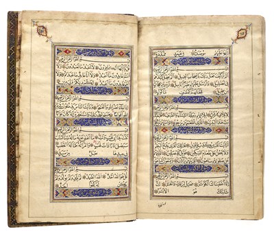 Lot 7 - A FINE ILLUMINATED QUR'AN COPIED BY MUHAMMAD AL-ISFAHANI, PERSIA, DATED 1878-9