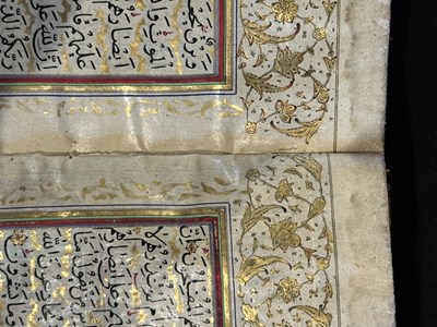 Lot 7 - A FINE ILLUMINATED QUR'AN COPIED BY MUHAMMAD AL-ISFAHANI, PERSIA, DATED 1878-9