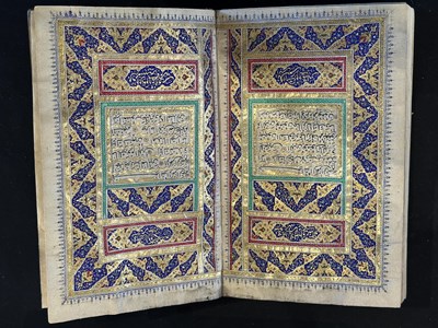 Lot 7 - A FINE ILLUMINATED QUR'AN COPIED BY MUHAMMAD AL-ISFAHANI, PERSIA, DATED 1878-9
