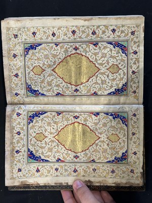 Lot 7 - A FINE ILLUMINATED QUR'AN COPIED BY MUHAMMAD AL-ISFAHANI, PERSIA, DATED 1878-9
