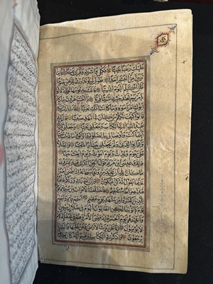 Lot 7 - A FINE ILLUMINATED QUR'AN COPIED BY MUHAMMAD AL-ISFAHANI, PERSIA, DATED 1878-9
