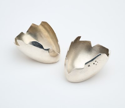Lot 682 - A PAIR OF VICTORIAN SILVER NOVELTY EGG CUPS, E. & E. EMANUEL, LONDON, 1884
