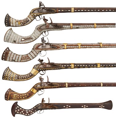 Lot 384 - FIVE DECORATIVE INDIAN FLINTLOCK JEZAILS, AND A DECORATIVE INDIAN BLUNDERBUSS