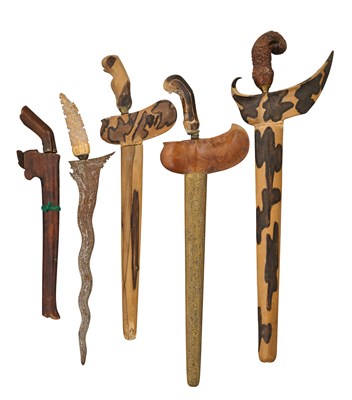 Lot 389 - TEN BALINESE OR SUMATRAN KRIS, AND TWO SUMATRAN BADIKS, 19TH CENTURY AND LATER