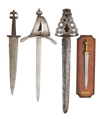 Lot 408 - THREE LEFT-HAND DAGGERS, 19TH CENTURY