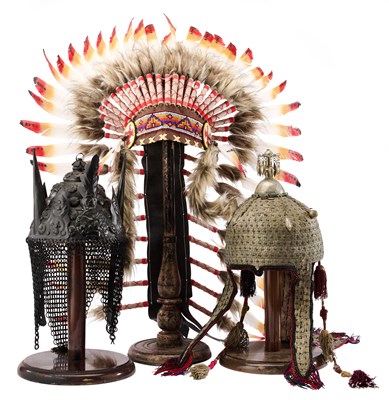Lot 394 - A CENTRAL ASIAN (TURKOMAN) CEREMONIAL HEADDRESS, A MODERN FANTASY HELMET, AND A MODERN