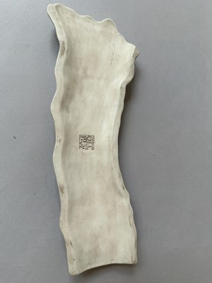 Lot 27 - A RARE CHINESE BISCUIT WRIST REST BY WANG BINGRONG