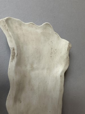 Lot 27 - A RARE CHINESE BISCUIT WRIST REST BY WANG BINGRONG