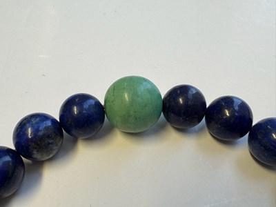 Lot 25 - A CHINESE LAPIS LAZULI PRAYER BRACELET, QING DYNASTY (1644-1911)