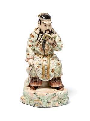Lot 180 - A JAPANESE SATSUMA FIGURE OF A SEATED DIETY, MEIJI/TAISHO PERIOD