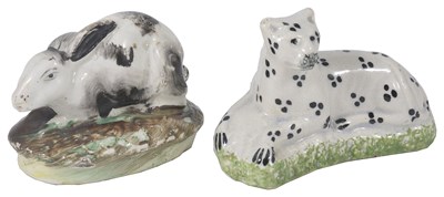 Lot 13 - A STAFFORDSHIRE POTTERY FIGURE OF A CHEETAH