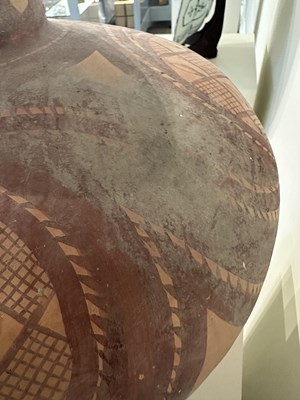 Lot 47 - A CHINESE PAINTED RED POTTERY JAR, NEOLITHIC PERIOD, MAJIAYAO CULTURE, BANSHAN TYPE, CIRCA 3RD MILLENIUM BC