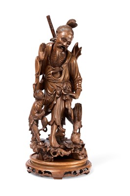 Lot 30 - A CHINESE CARVED WOOD FIGURE OF A FISHERMAN, LATE QING DYNASTY