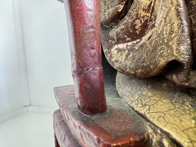 Lot 29 - A CHINESE CARVED WOOD AND GESSO FIGURE OF A SEATED DIGNITARY, QING DYNASTY