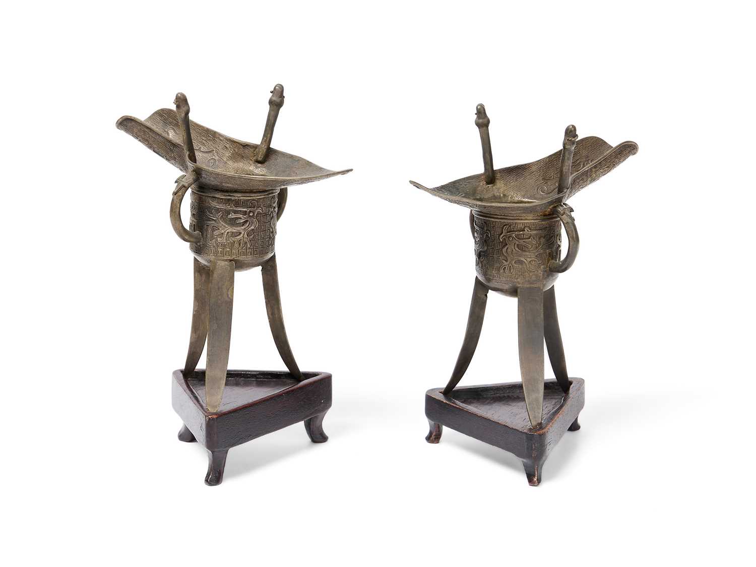 Lot 57 - A PAIR OF CHINESE ARCHAISTIC WHITE METAL LIBATION CUPS, JUE, QING DYNASTY, 19TH CENTURY