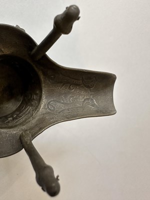 Lot 57 - A PAIR OF CHINESE ARCHAISTIC WHITE METAL LIBATION CUPS, JUE, QING DYNASTY, 19TH CENTURY