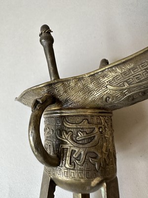 Lot 57 - A PAIR OF CHINESE ARCHAISTIC WHITE METAL LIBATION CUPS, JUE, QING DYNASTY, 19TH CENTURY