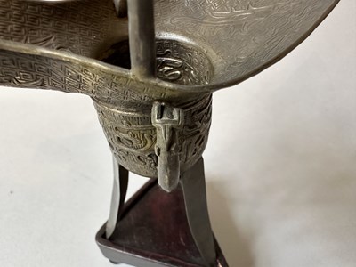 Lot 57 - A PAIR OF CHINESE ARCHAISTIC WHITE METAL LIBATION CUPS, JUE, QING DYNASTY, 19TH CENTURY
